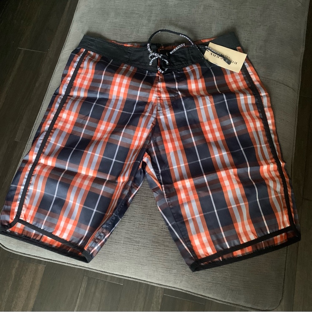 New Burberry mens swim trunks size small.